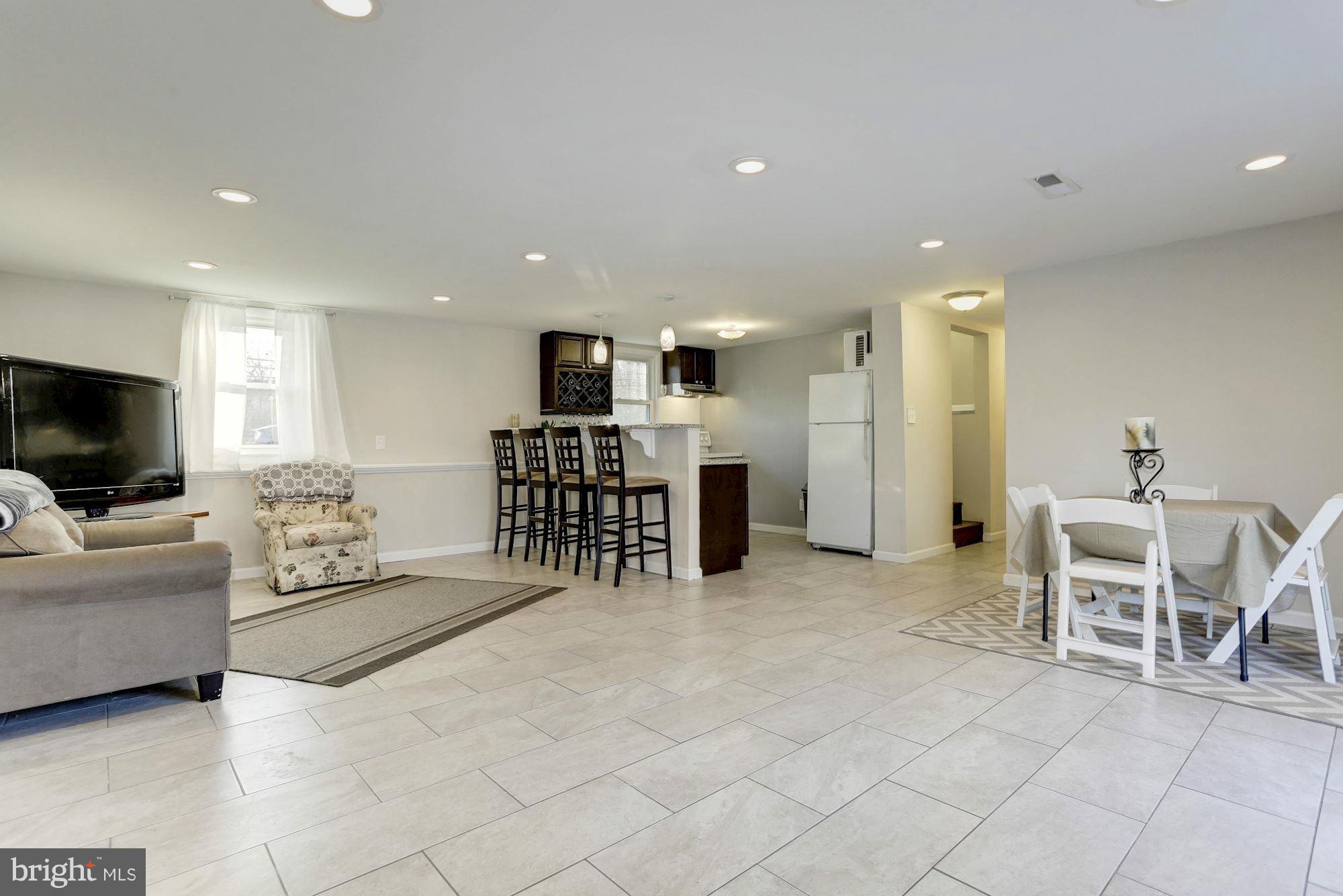 4634 Mountain Road Pasadena, MD 21122 - Photo 20 of 30 Lower level family room and 2nd kitchen
