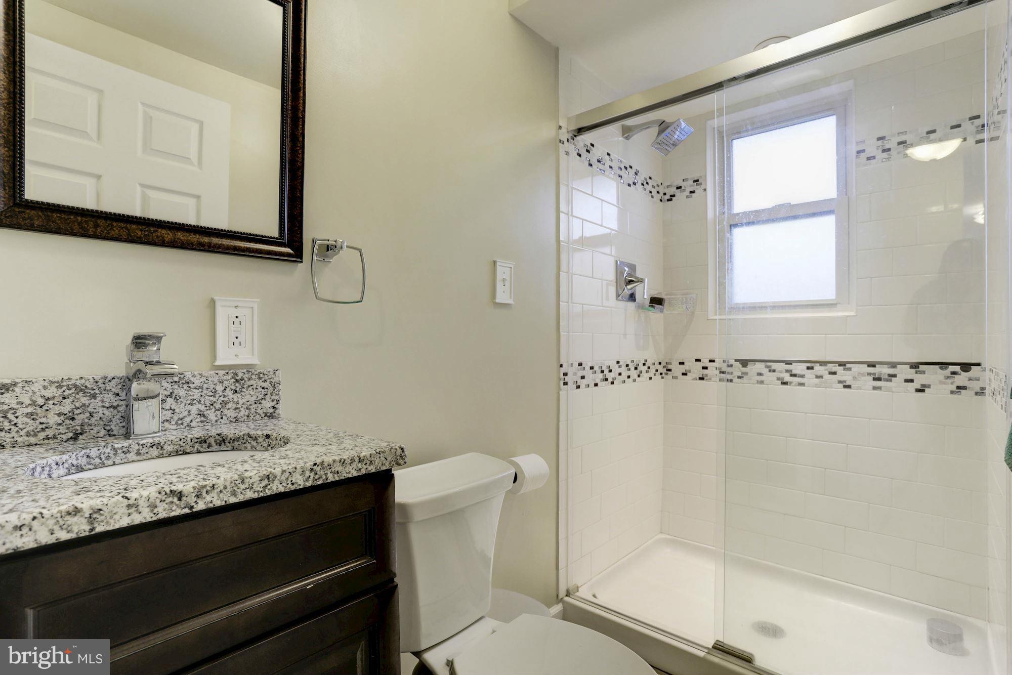 4634 Mountain Road Pasadena, MD 21122 - Photo 24 of 30 New Bath with granite and ceramic in Lower Level