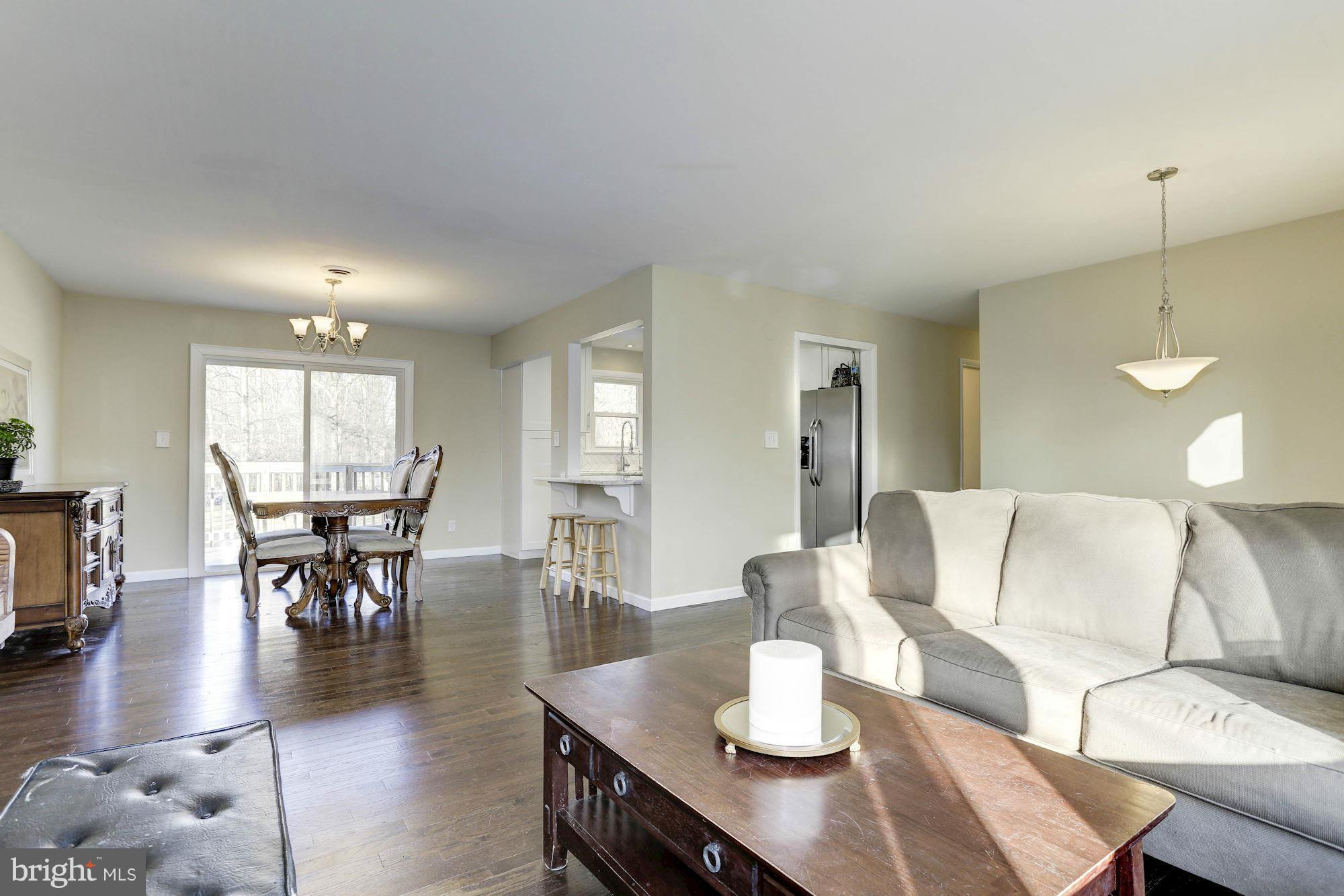4634 Mountain Road Pasadena, MD 21122 - Photo 9 of 30 Living Room boasts gorgeous new hardwoods!