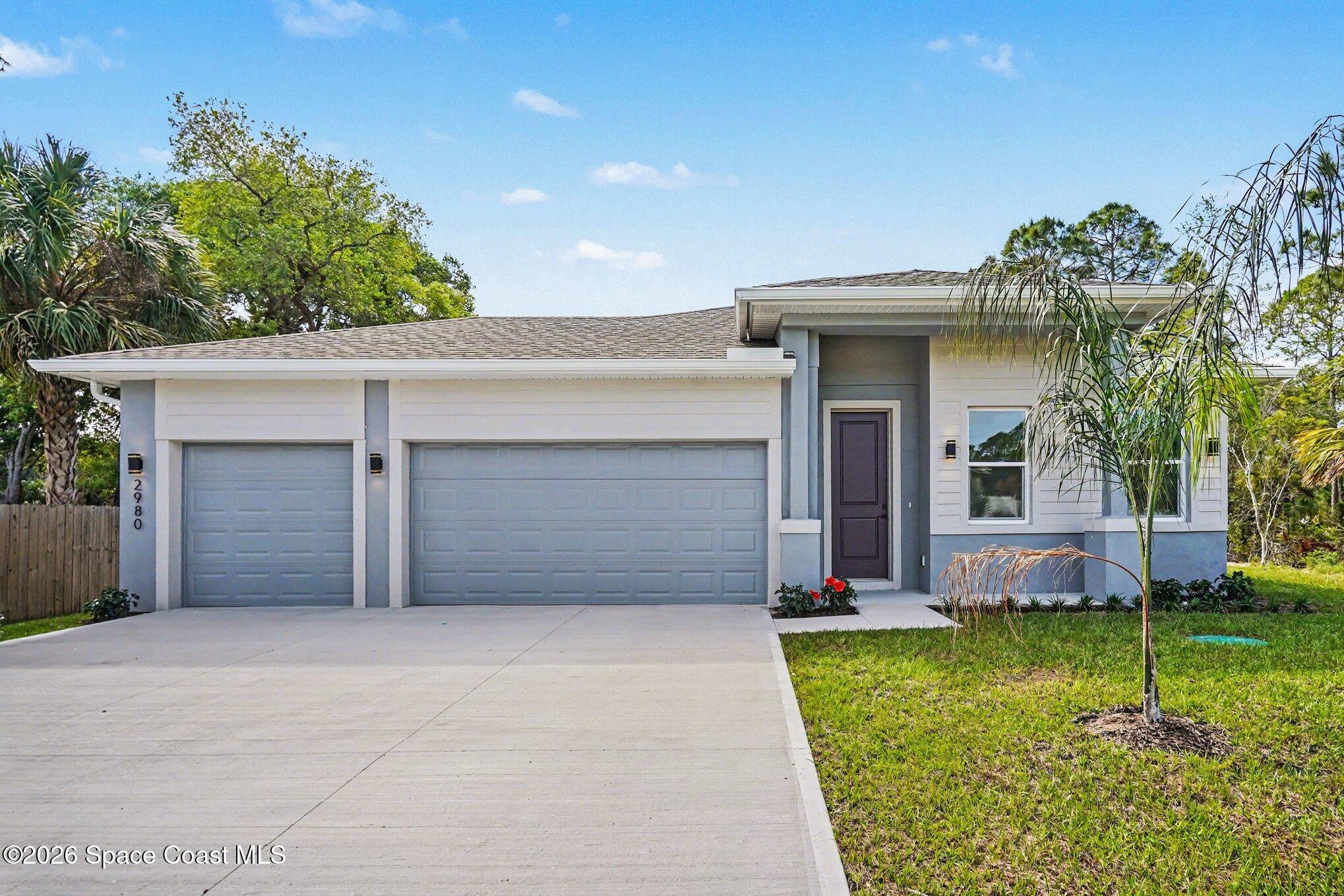 2980 Tishman Road Southeast Palm Bay, FL 32909 - Photo 2 of 30 002_file_7868