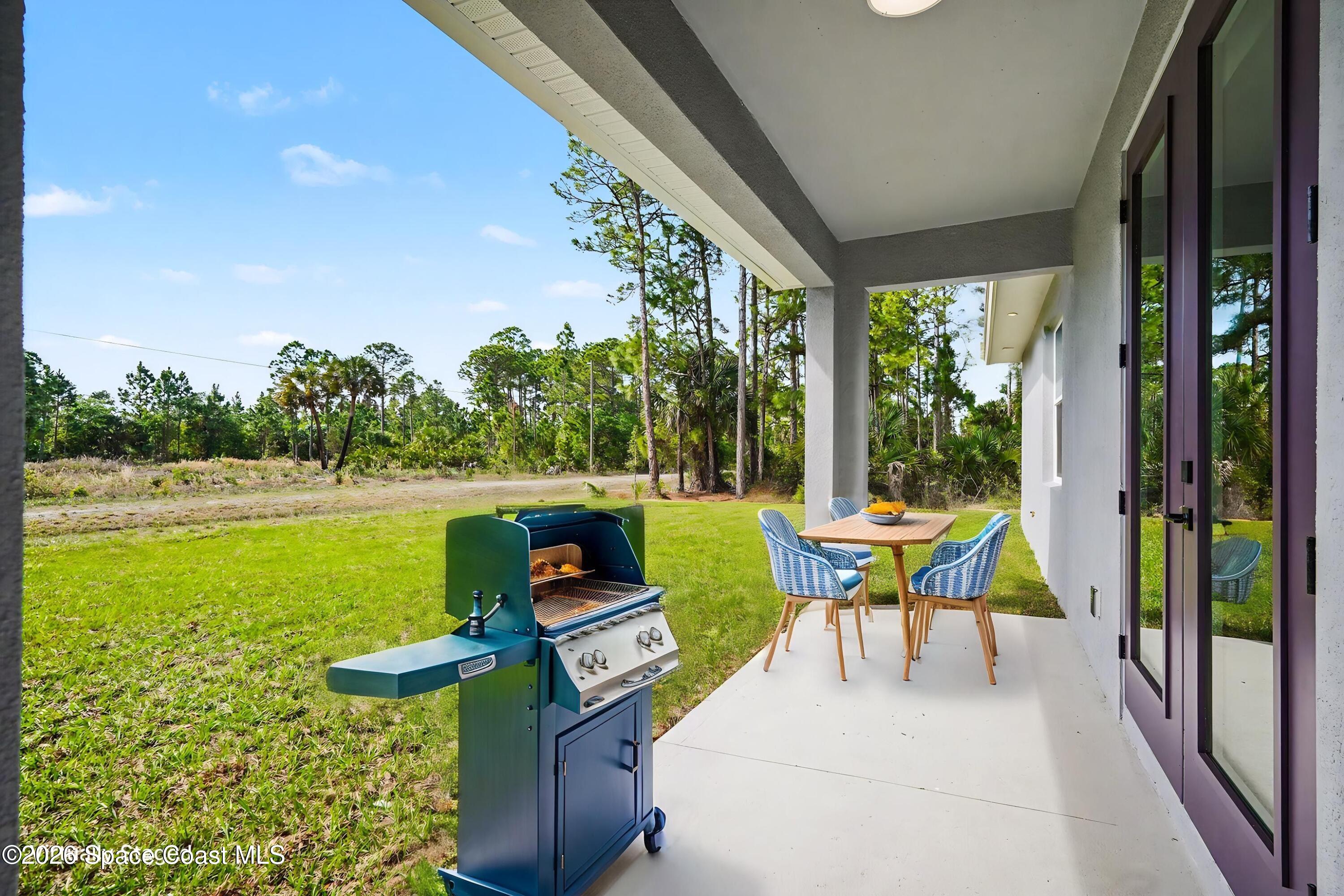 2980 Tishman Road Southeast Palm Bay, FL 32909 - Photo 29 of 30 Back porch staged