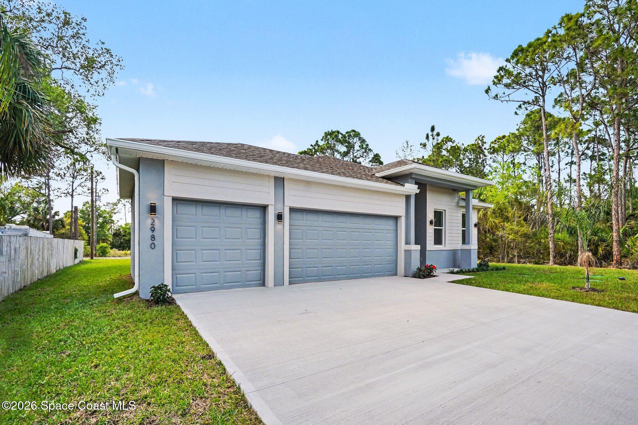 2980 Tishman Road Southeast Palm Bay, FL 32909 - Photo 3 of 30 003_file_8549