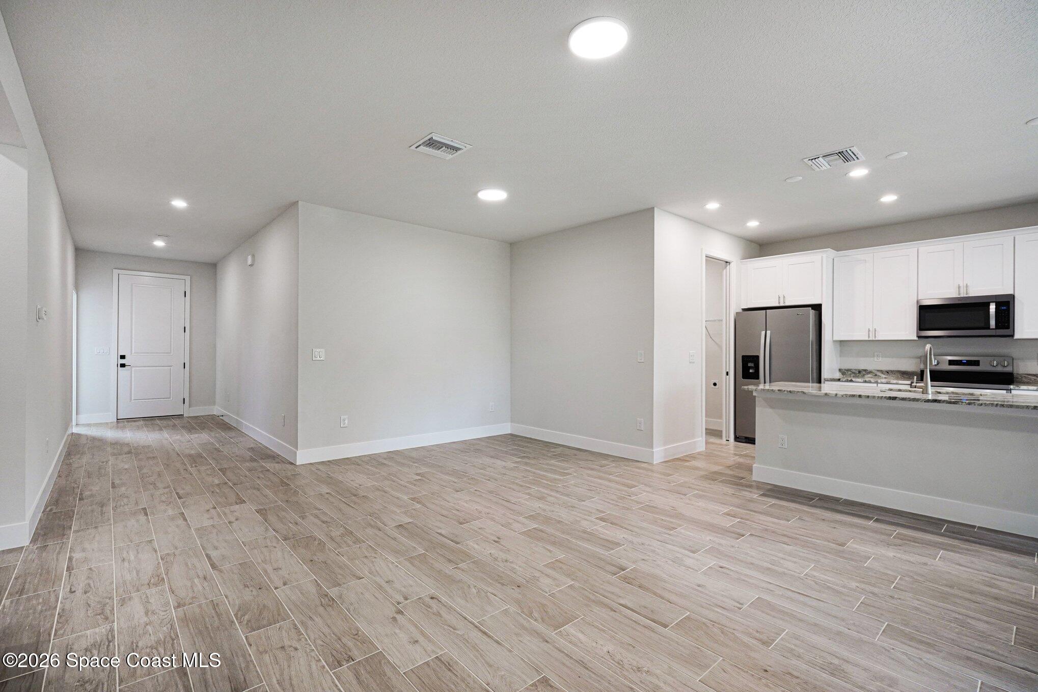 2980 Tishman Road Southeast Palm Bay, FL 32909 - Photo 4 of 30 004_file_6583