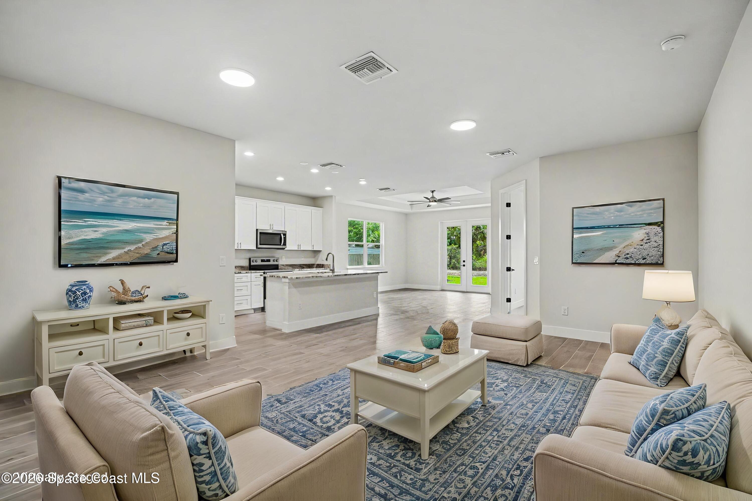 2980 Tishman Road Southeast Palm Bay, FL 32909 - Photo 5 of 30 Living room staged