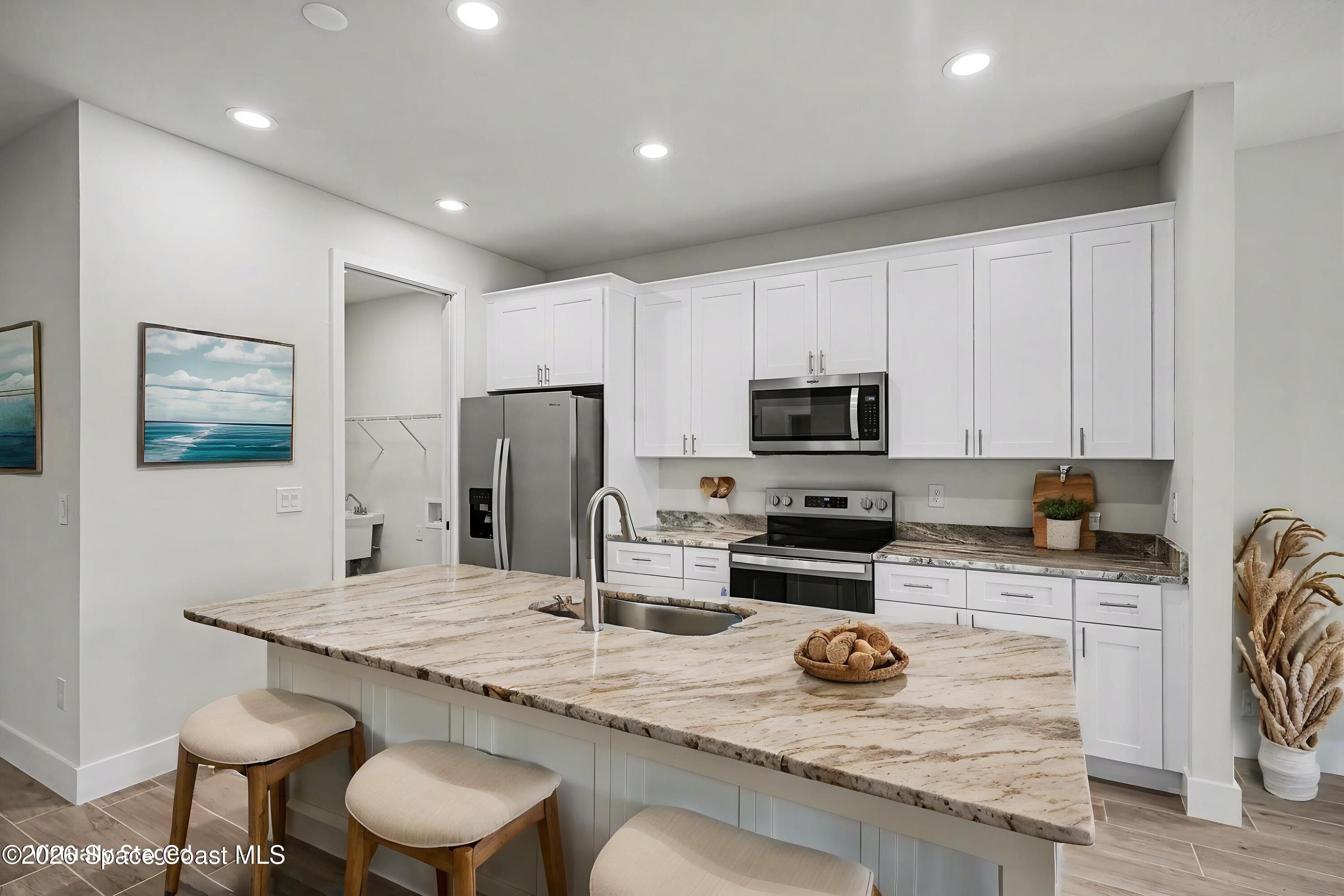 2980 Tishman Road Southeast Palm Bay, FL 32909 - Photo 9 of 30 Kitchen staged