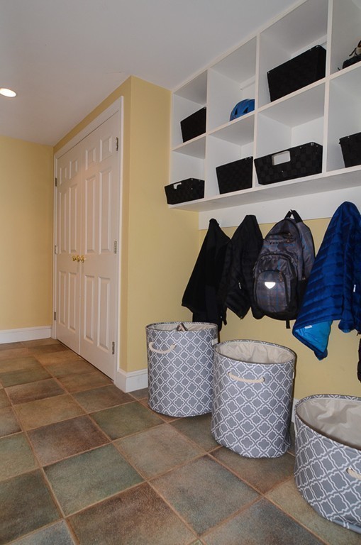 154 Hampshire Road Wellesley, MA 02481 - Photo 23 of 30 a living room with a couch and a walk in closet
