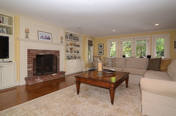 154 Hampshire Road Wellesley, MA 02481 - Photo 8 of 30 a living room with furniture and a fireplace