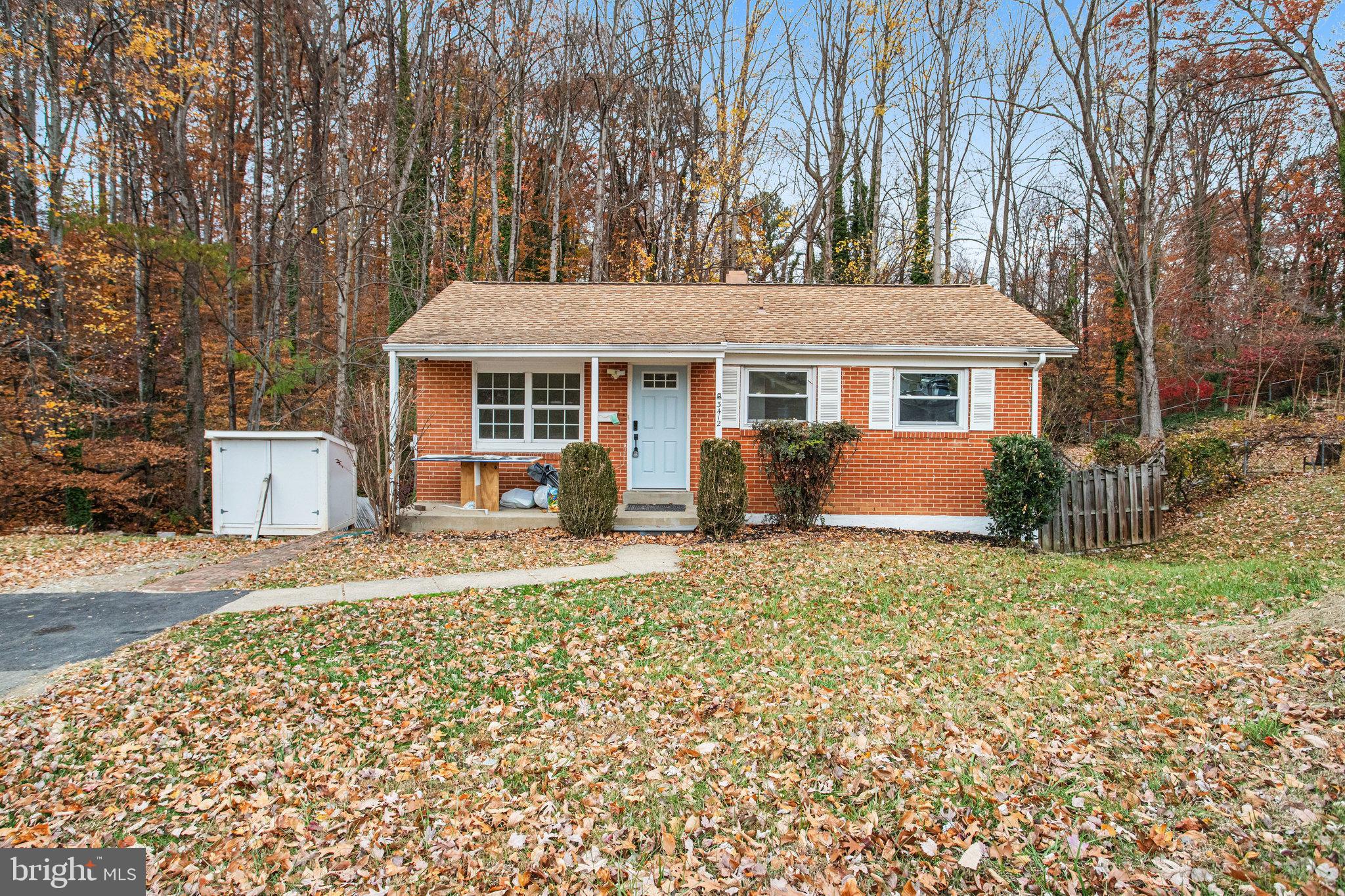 3412 North Beaumont Road Woodbridge, VA 22193 - Photo 3 of 34 front view of a house with a yard