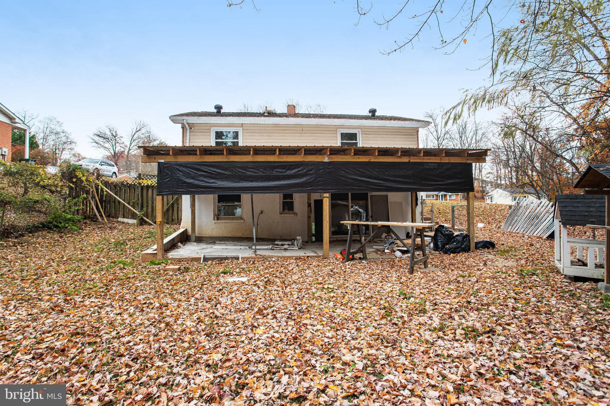 3412 North Beaumont Road Woodbridge, VA 22193 - Photo 32 of 34 a view of a dinning table and chairs in patio