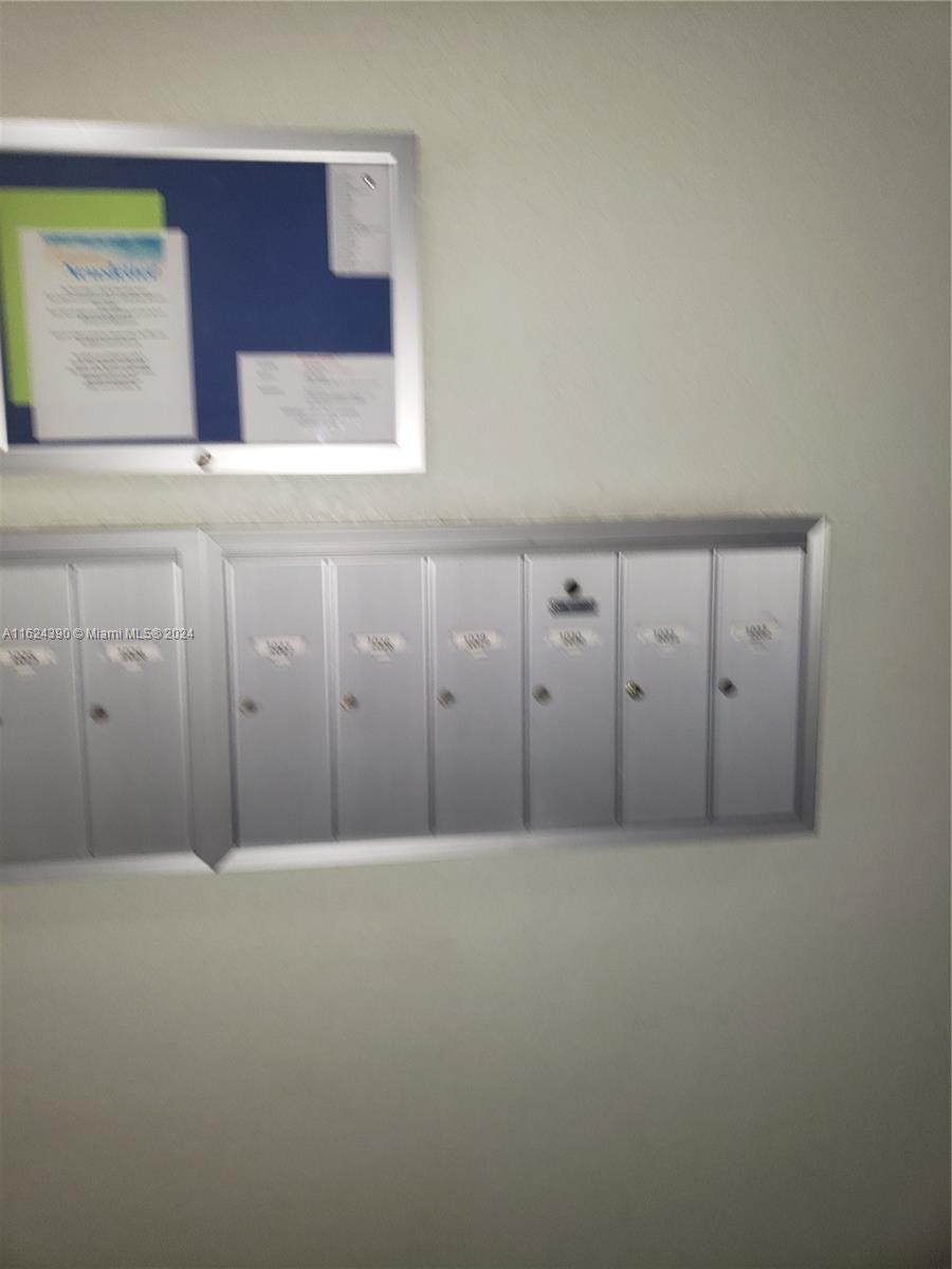 2220 Northeast 68th Street, Unit 1028 Fort Lauderdale, FL 33308 - Photo 22 of 39 Mailboxes at entry/foyer of building