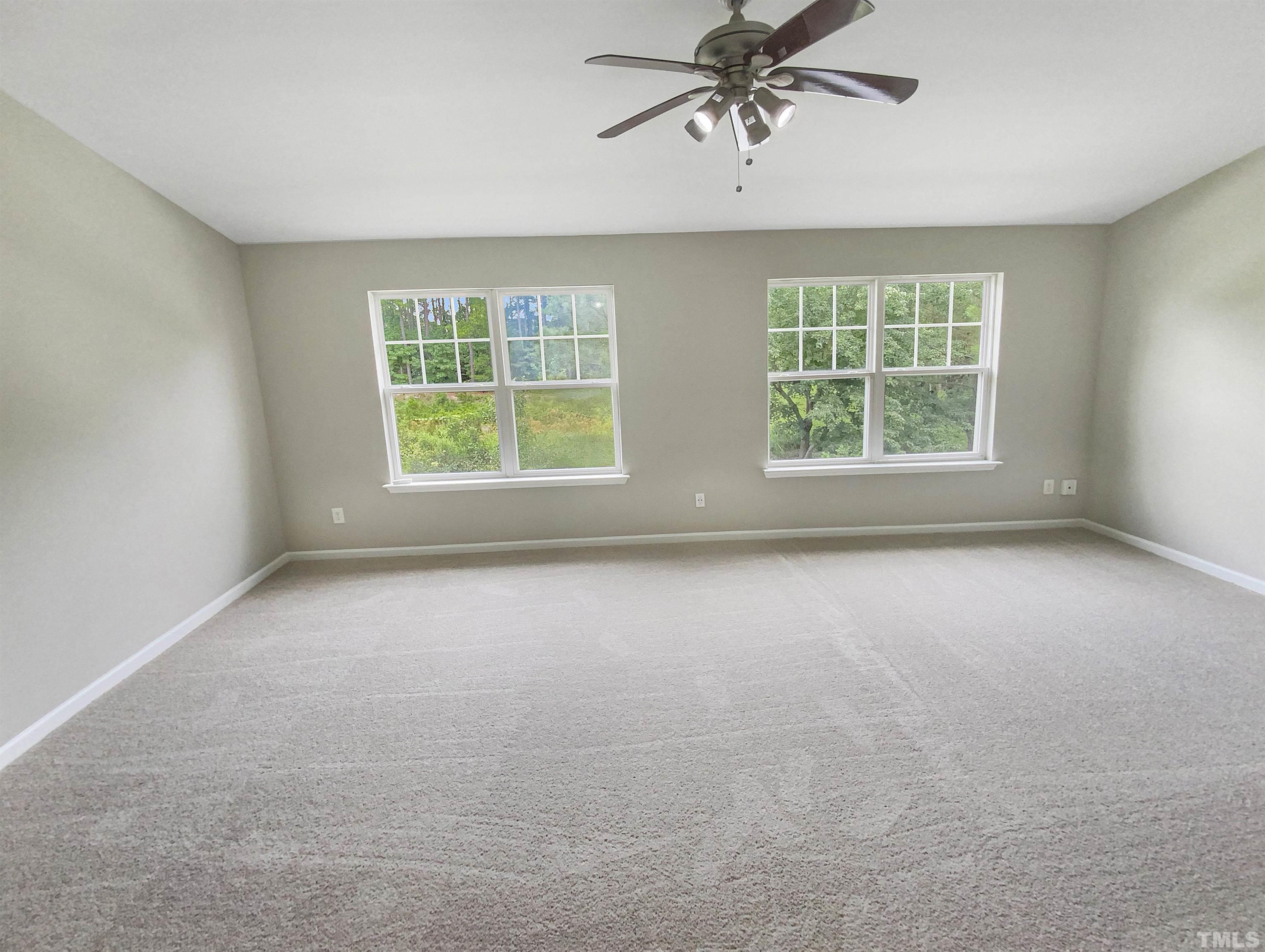 5105 Sandy Banks Road Raleigh, NC 27616 - Photo 5 of 15 an empty room with a window