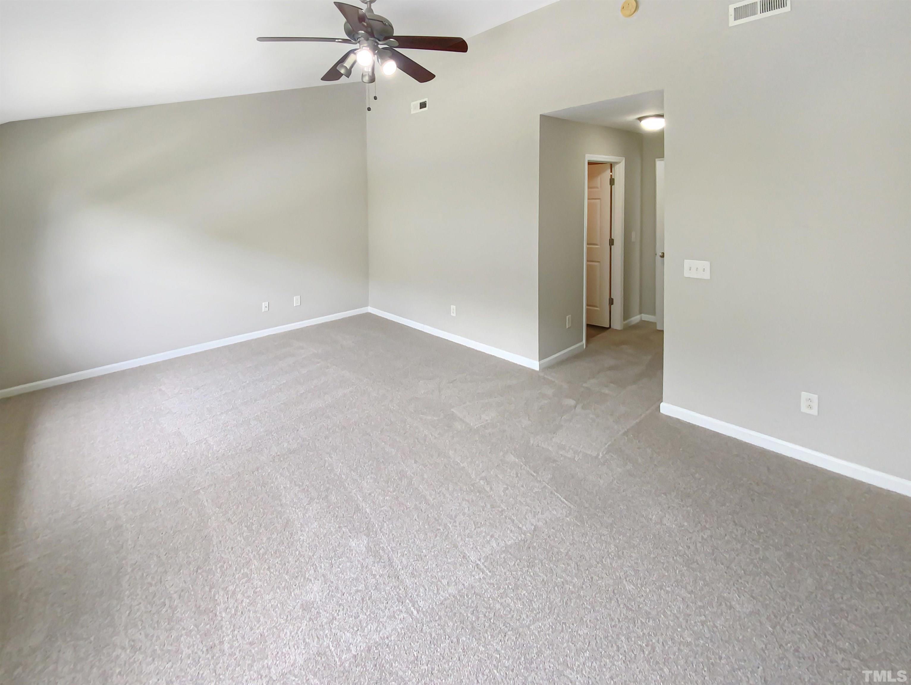 5105 Sandy Banks Road Raleigh, NC 27616 - Photo 8 of 15 an empty room with a bathroom