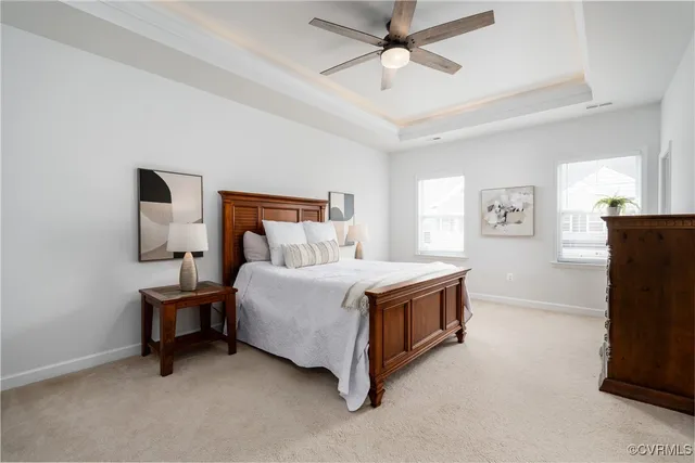 a bed room with a bed and a tv