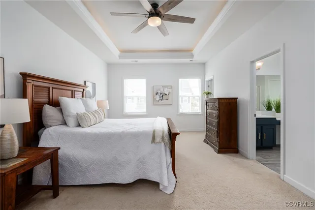 a bed room with a bed and a chandelier