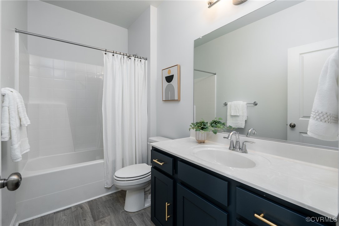 4816 Breeching Dee Lane Henrico, VA 23294 - Photo 19 of 25 a bathroom with a granite countertop sink toilet and shower