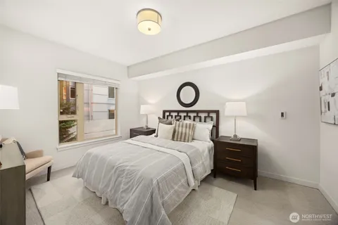 a bedroom with a bed and a closet