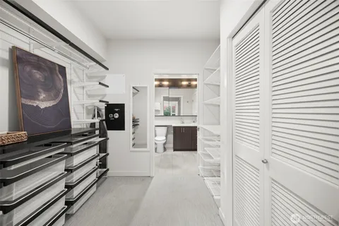 a kitchen with stainless steel appliances a refrigerator and a stove