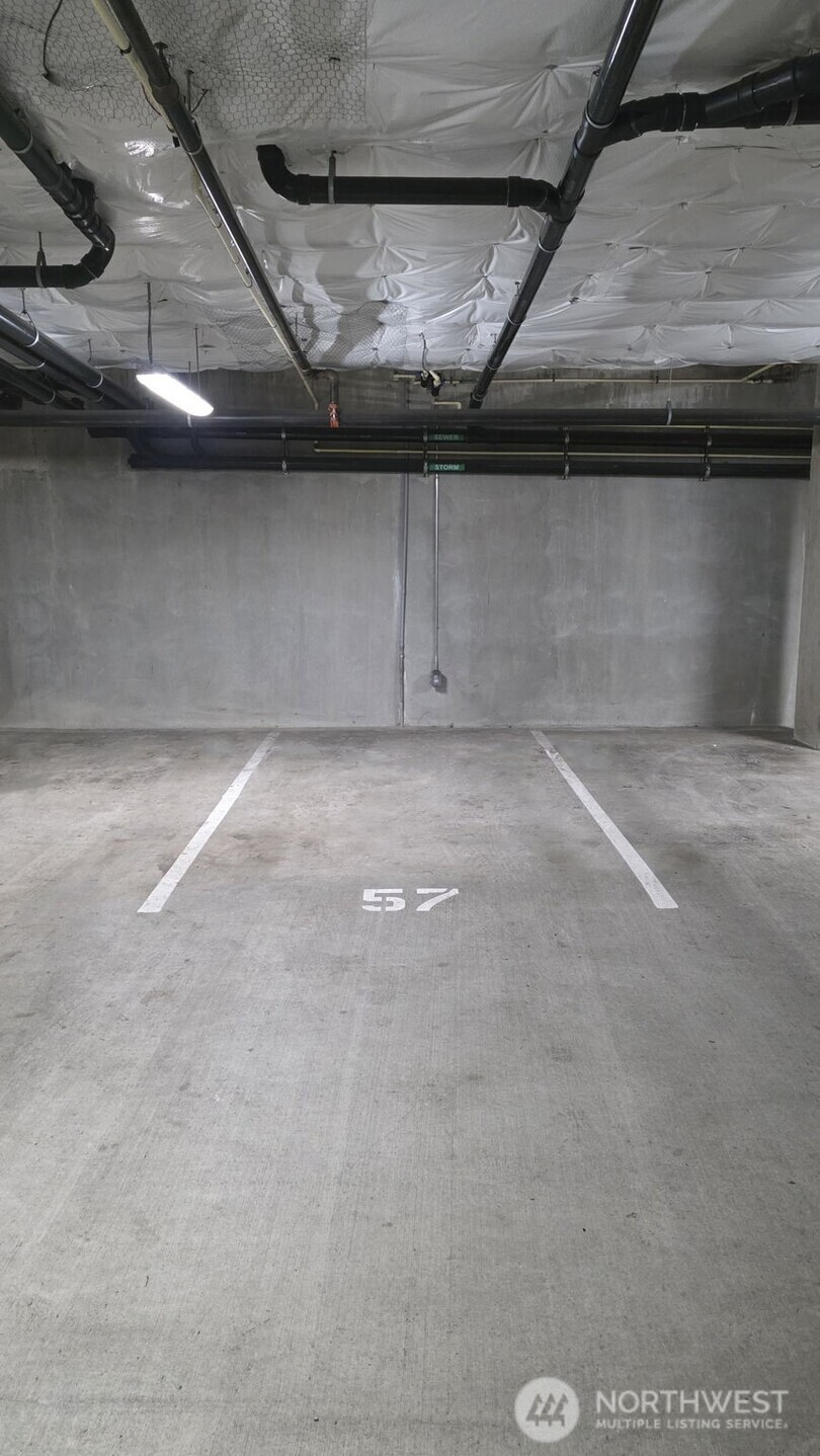 1760 Northwest 56th Street, Unit 309 Seattle, WA 98107 - Photo 26 of 30 a view of a garage