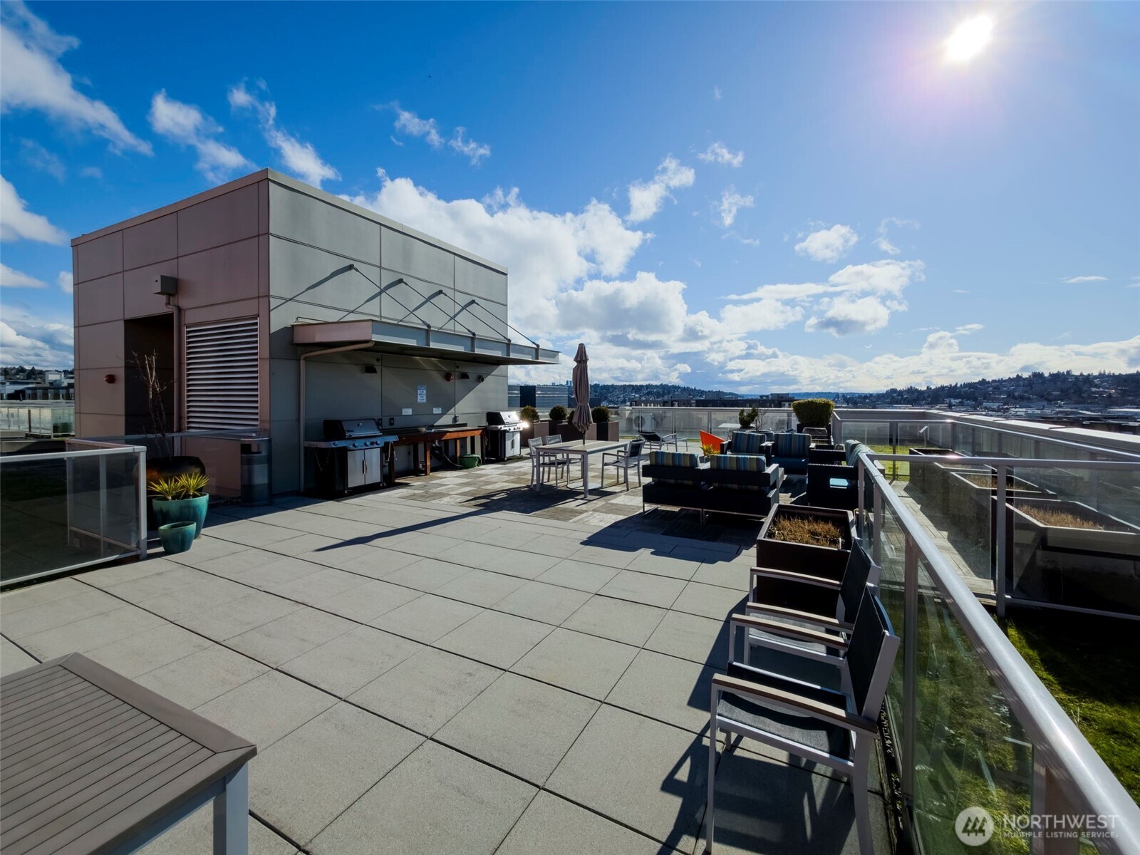 1760 Northwest 56th Street, Unit 309 Seattle, WA 98107 - Photo 28 of 30 a view of a patio with swimming pool