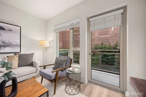 a living room with furniture and a window