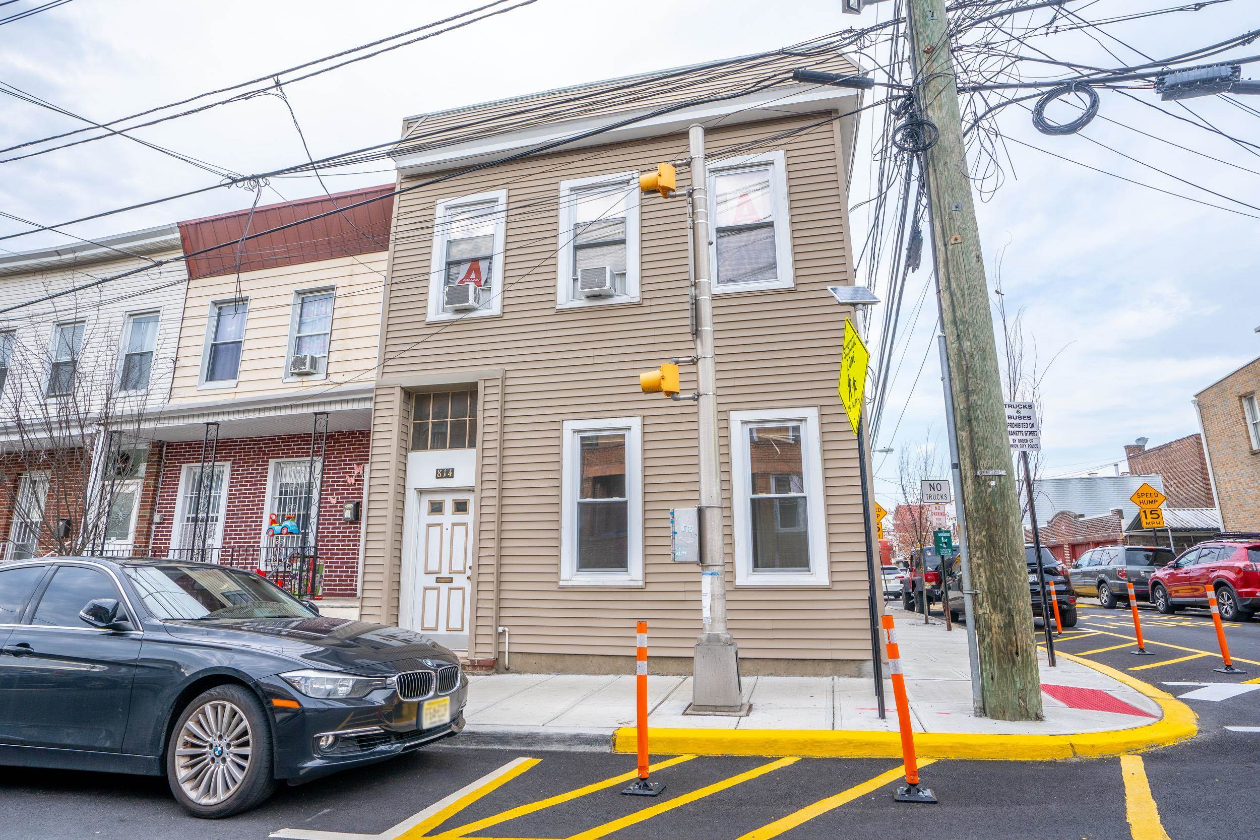 a front view of a house with outdoor space