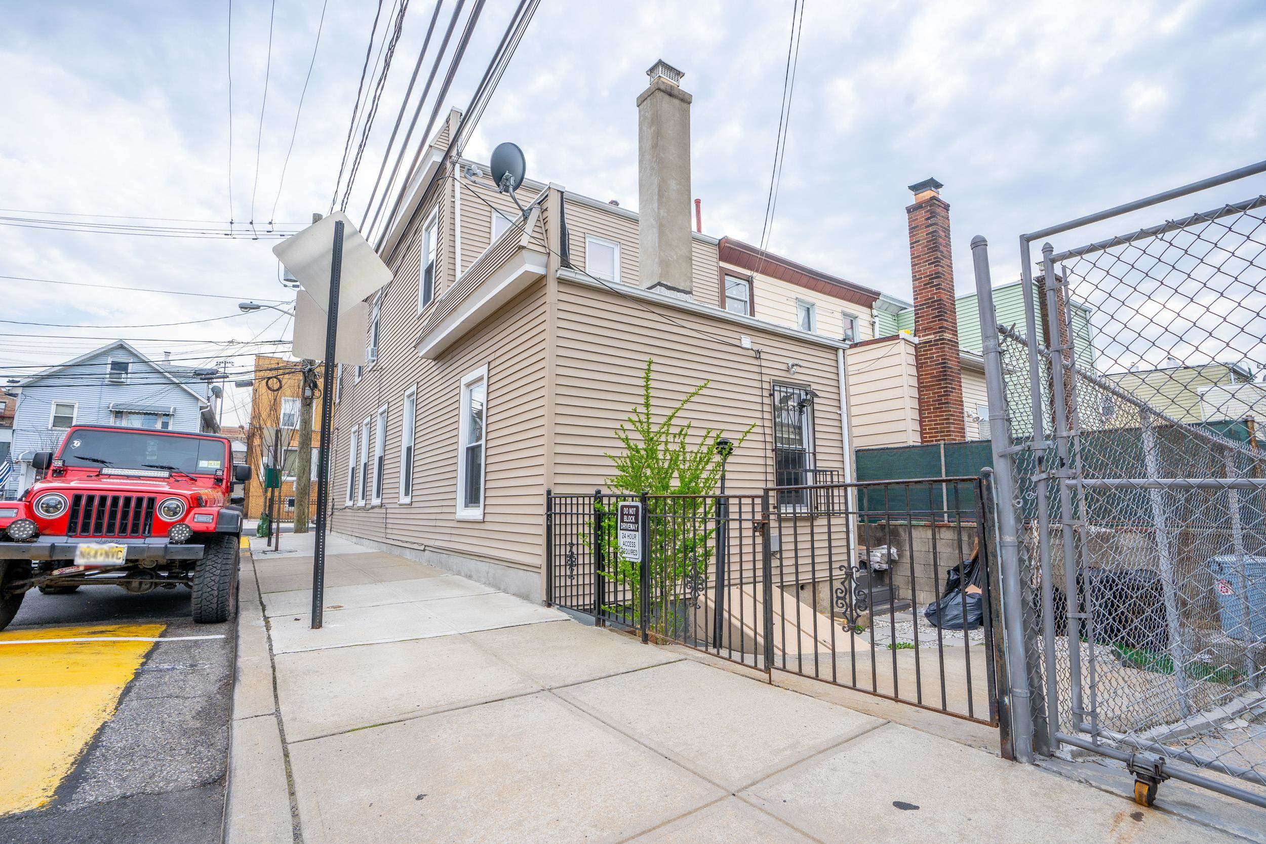 814 28th Street, Unit 2 Union City, NJ 07087 - Photo 4 of 12 a view of a street with cars