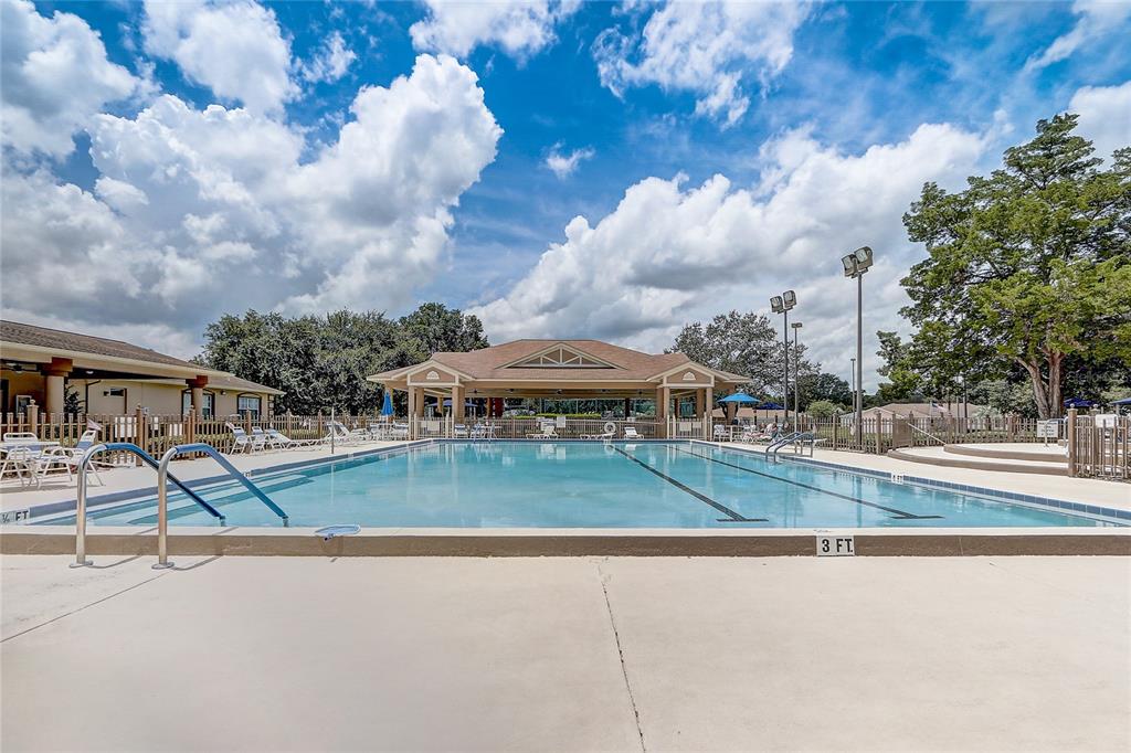 10031 Southwest 62nd Circle Ocala, FL 34476 - Photo 22 of 25 a view of a playground with basketball court