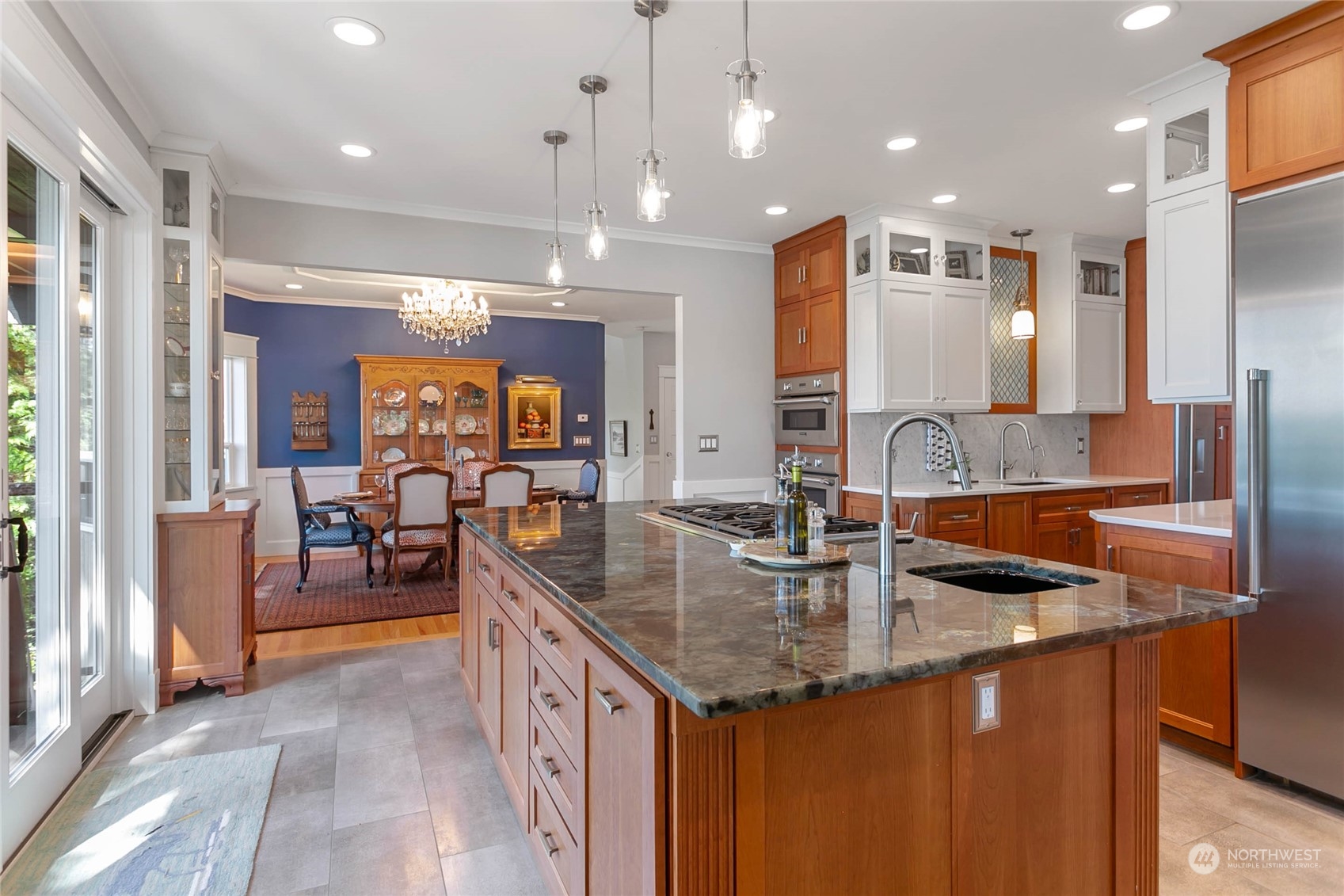 324 Sea Pines Road Bellingham, WA 98229 - Photo 14 of 40 a kitchen with stainless steel appliances granite countertop a sink and a refrigerator