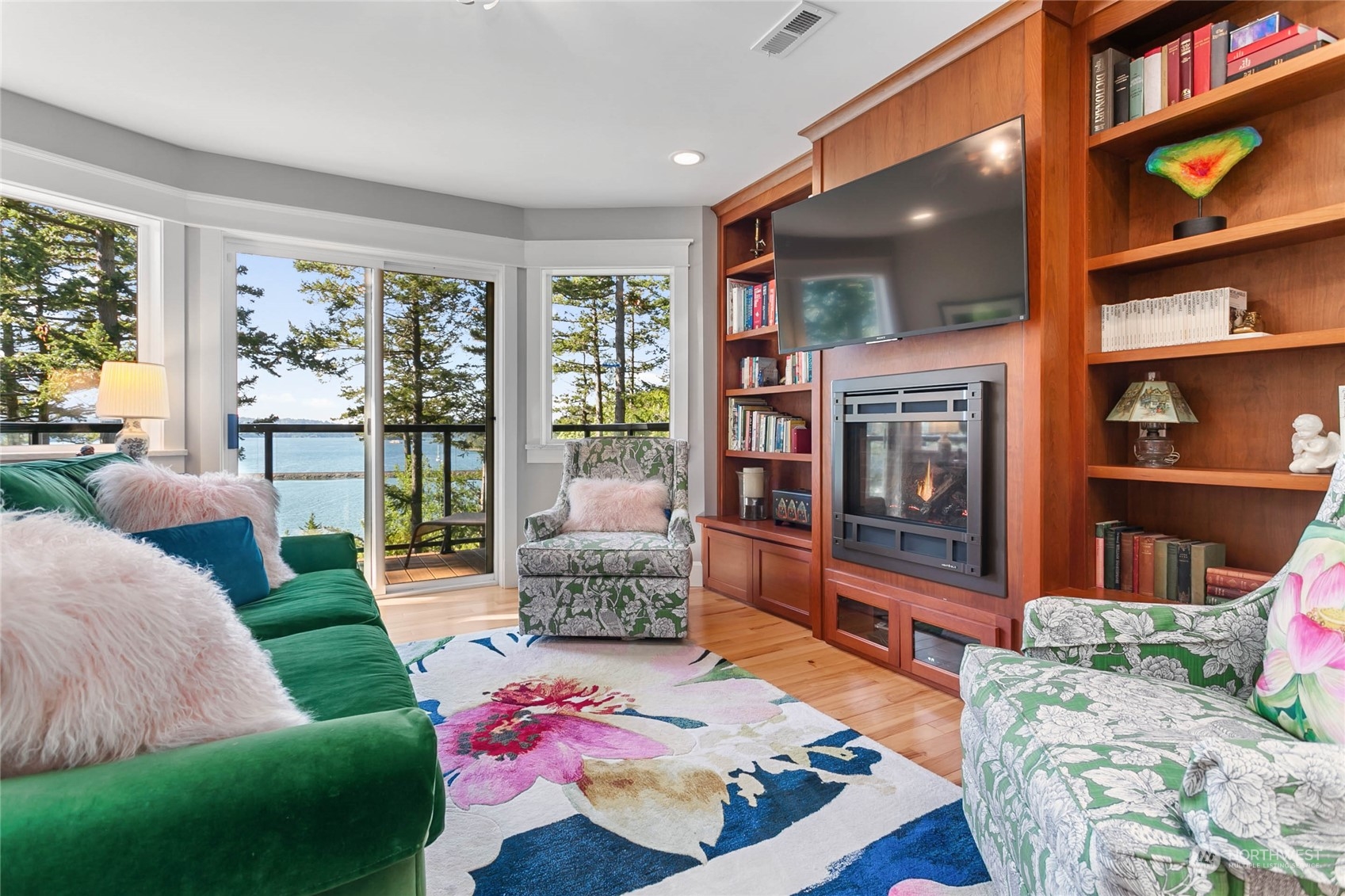 324 Sea Pines Road Bellingham, WA 98229 - Photo 26 of 40 a living room with furniture a rug and a flat screen tv