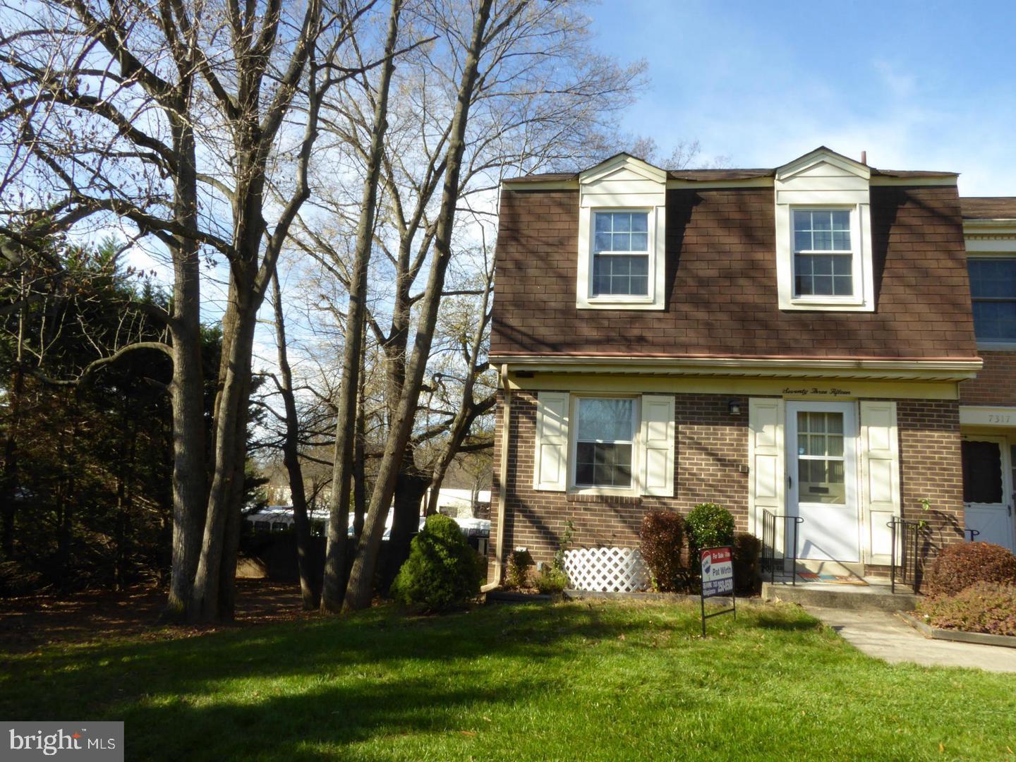 7315 Byeforde Court Springfield, VA 22150 - Photo 1 of 5 front view of house with a yard