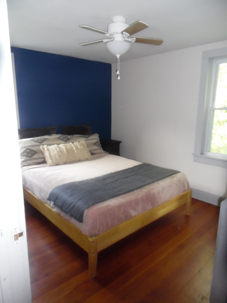 9838 East Flagg Road Rochelle, IL 61068 - Photo 9 of 12 a bedroom with a bed and window