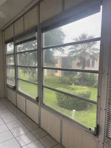 a view of a glass door with a window