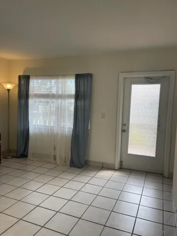 an empty room with a window