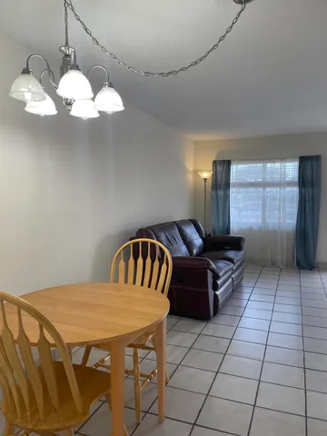 a view of a livingroom with furniture