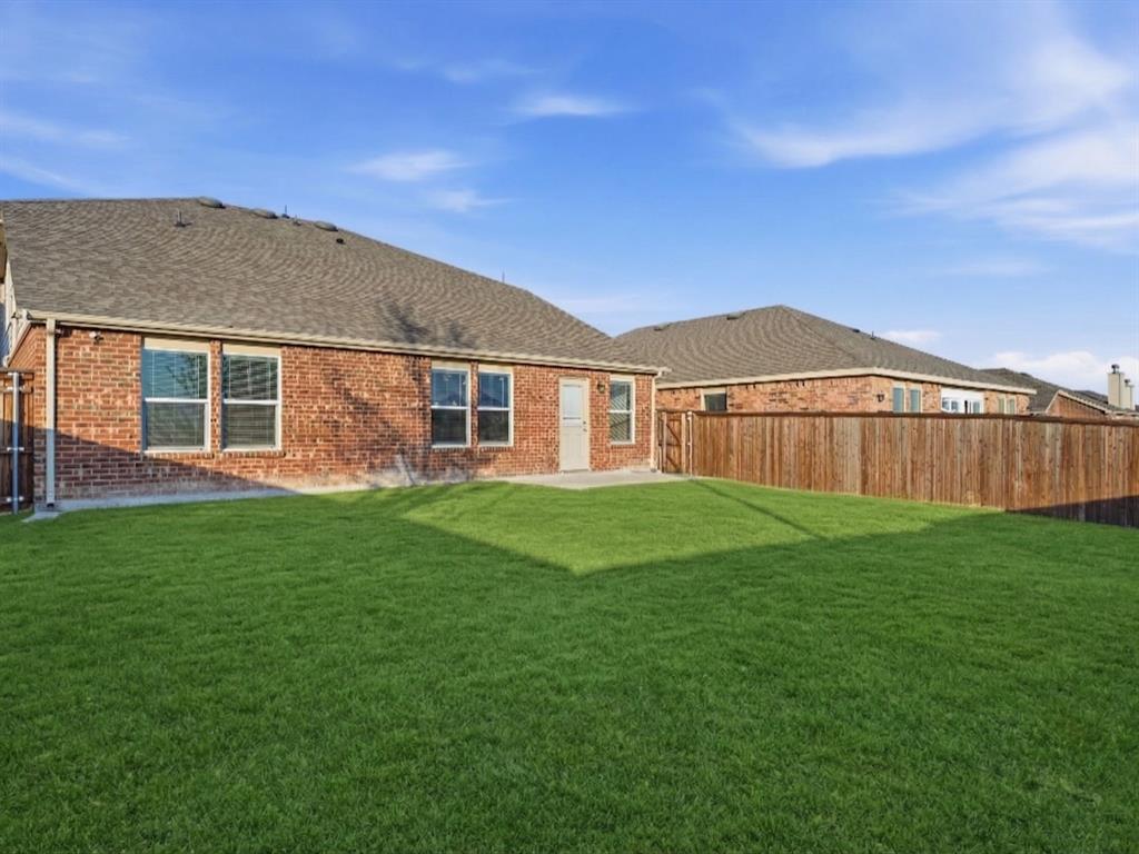 745 Brockwell Bend Forney, TX 75126 - Photo 33 of 36 Large and open backyard. Virtually enhanced image.
