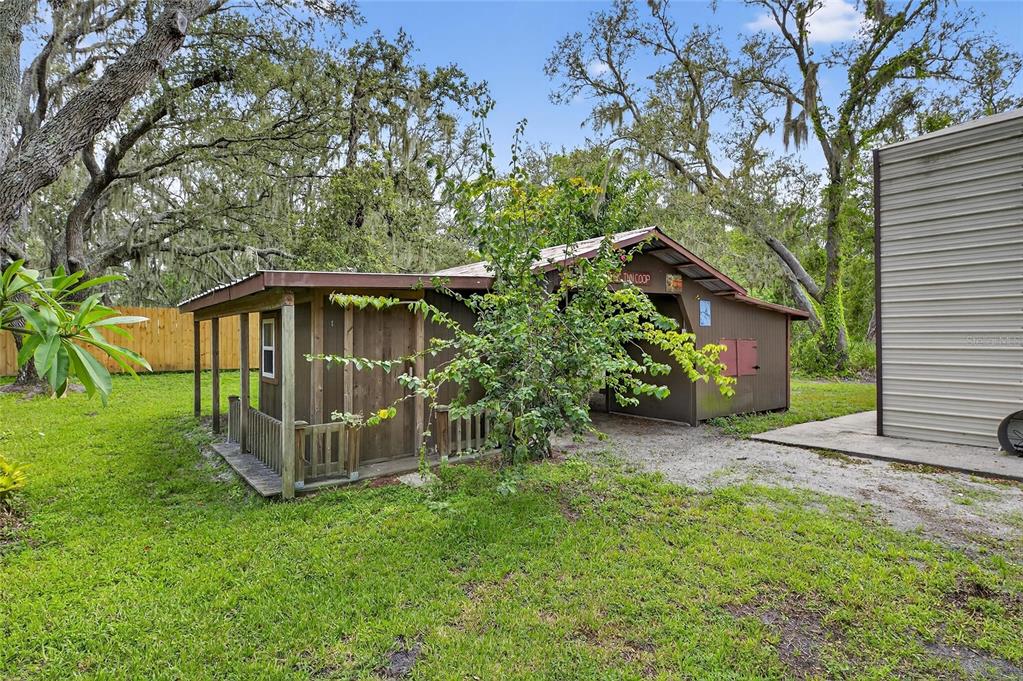 11205 McMullen Road Riverview, FL 33569 - Photo 16 of 46 a front view of a house with garden