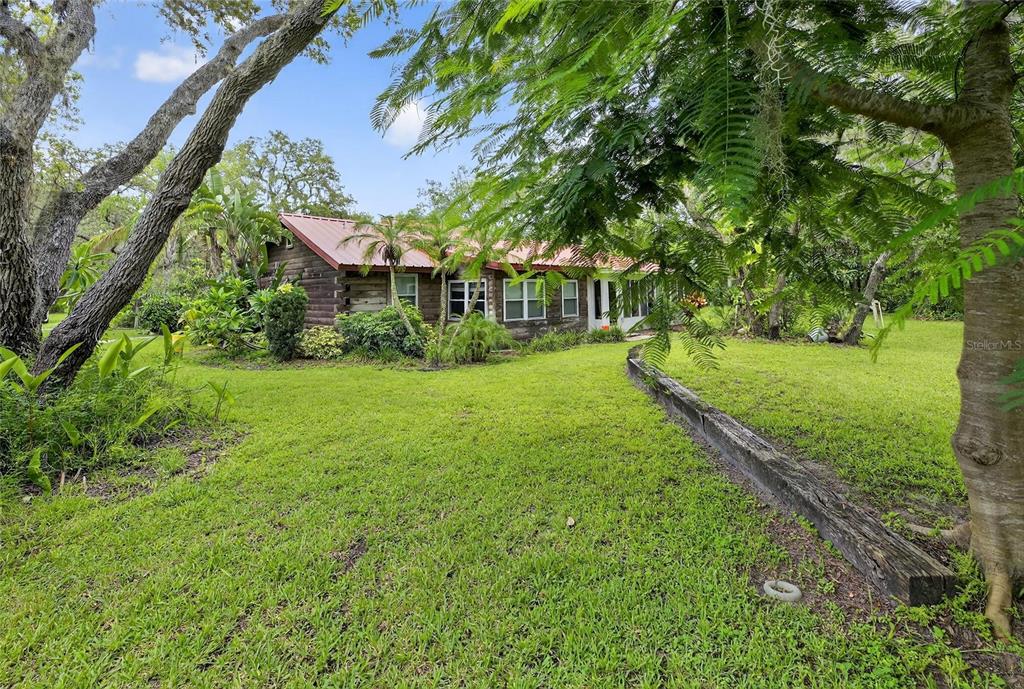 11205 McMullen Road Riverview, FL 33569 - Photo 19 of 46 a view of house with yard