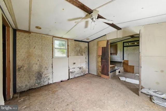 a bathroom with a tub and shower