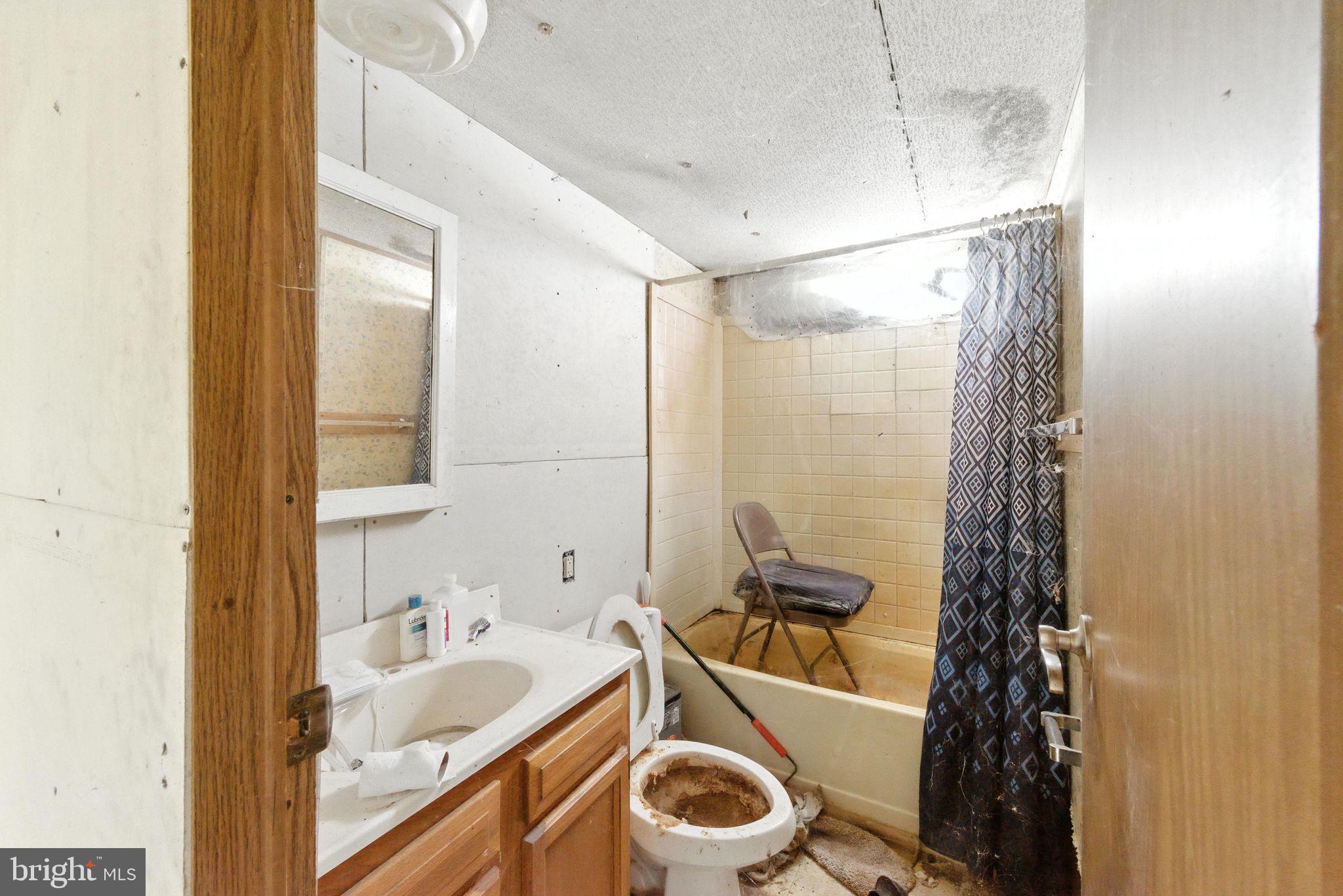 40 Ridge Road New Bloomfield, PA 17068 - Photo 9 of 29 a bathroom with a sink a toilet and shower