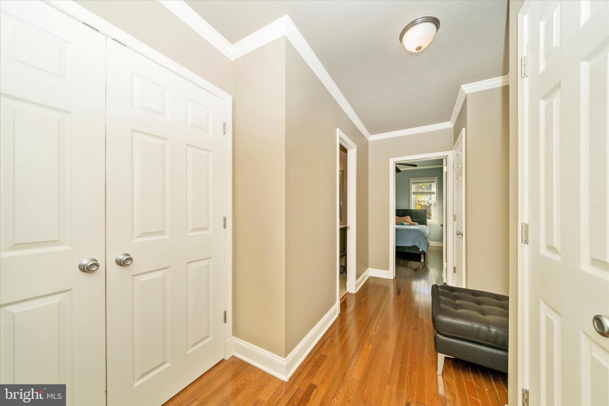 1221 William Street Baltimore, MD 21230 - Photo 26 of 44 a view of a hallway with wooden floor and staircase