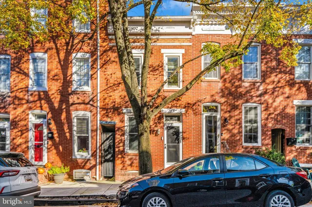 a car parked on the side of a street