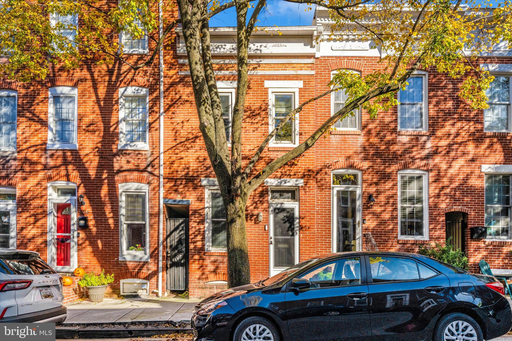 1221 William Street Baltimore, MD 21230 - Photo 3 of 44 a car parked on the side of a street