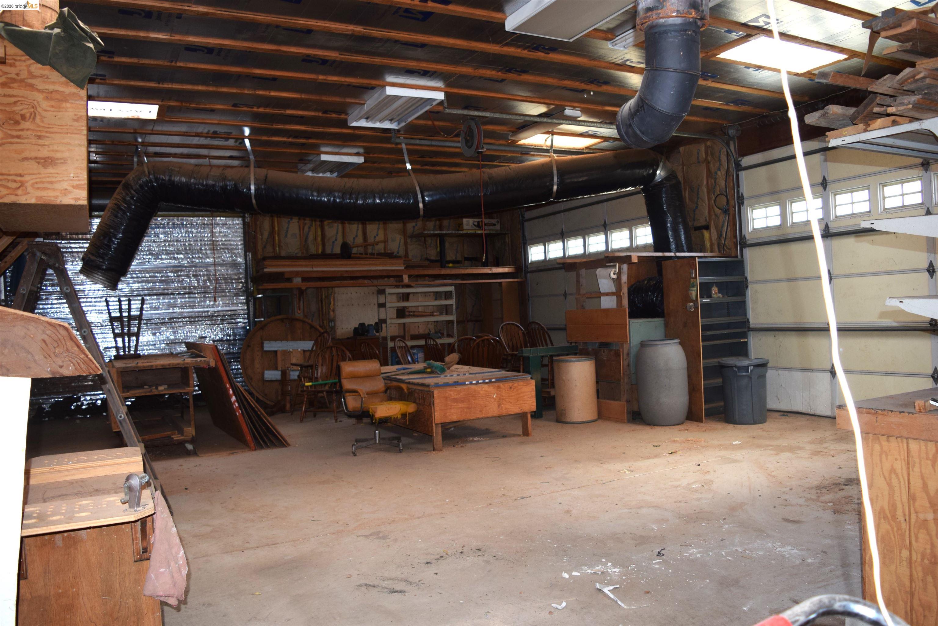 913 Quill Road Copperopolis, CA 95228 - Photo 13 of 55 a view of a room with gym equipment