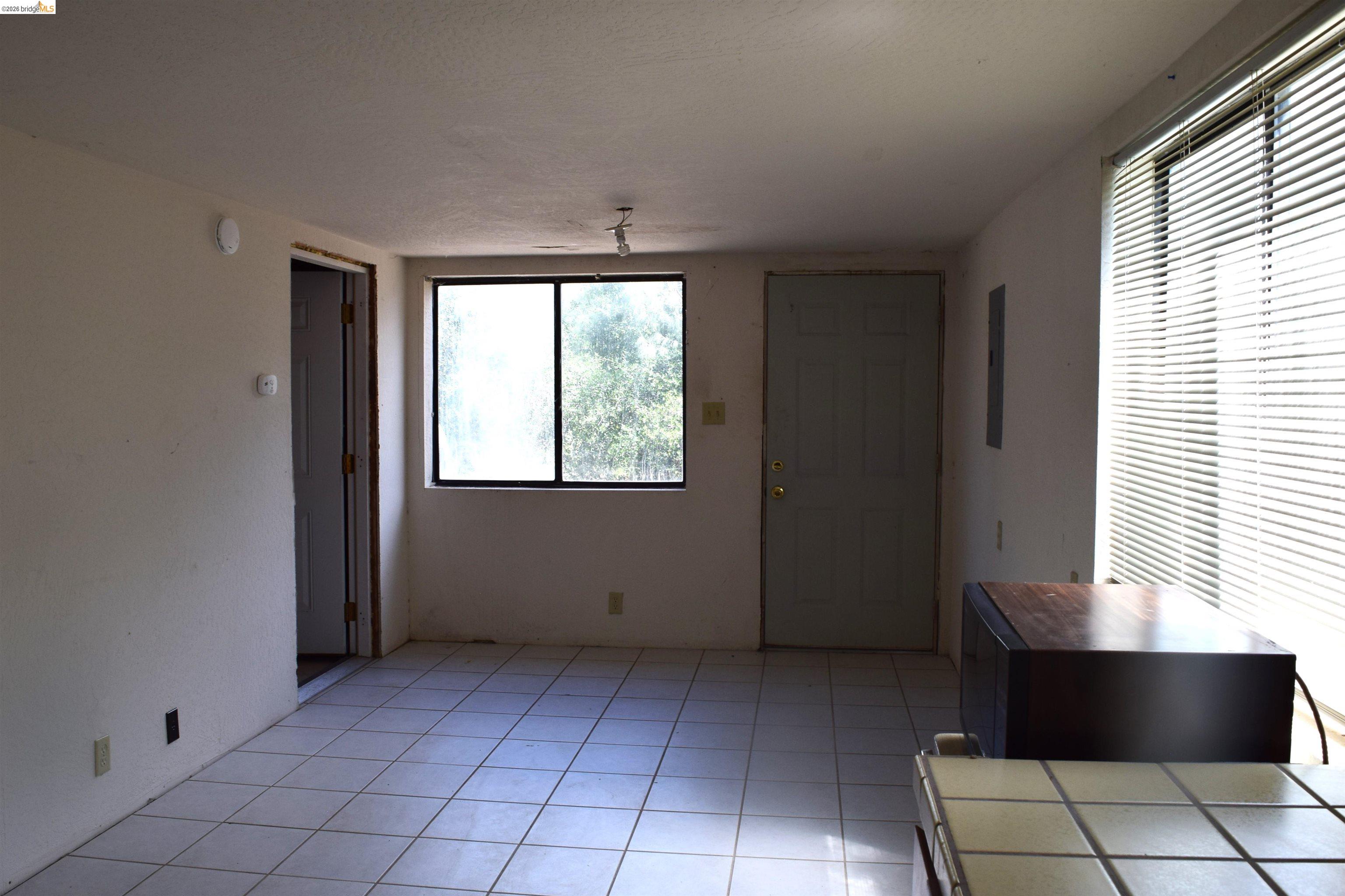 913 Quill Road Copperopolis, CA 95228 - Photo 16 of 55 a view of an empty room with a window