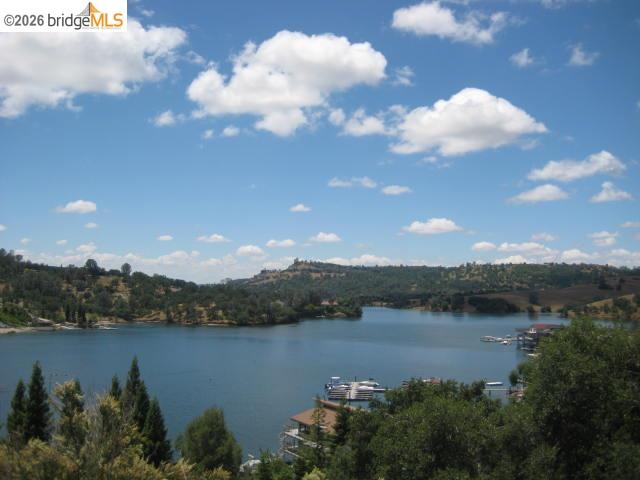 913 Quill Road Copperopolis, CA 95228 - Photo 2 of 55 a view of a lake from a yard
