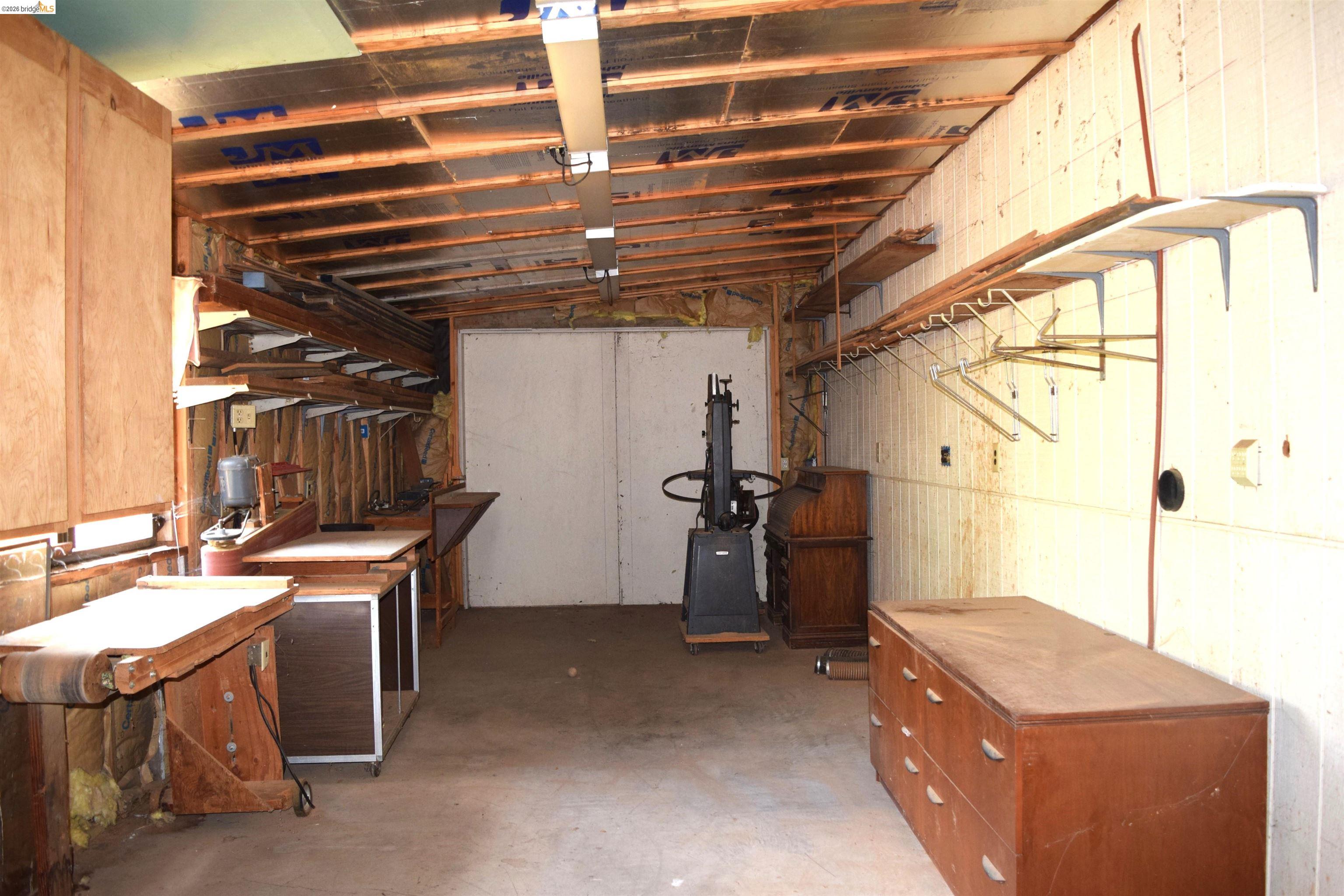913 Quill Road Copperopolis, CA 95228 - Photo 23 of 55 a storage room with washer and dryer