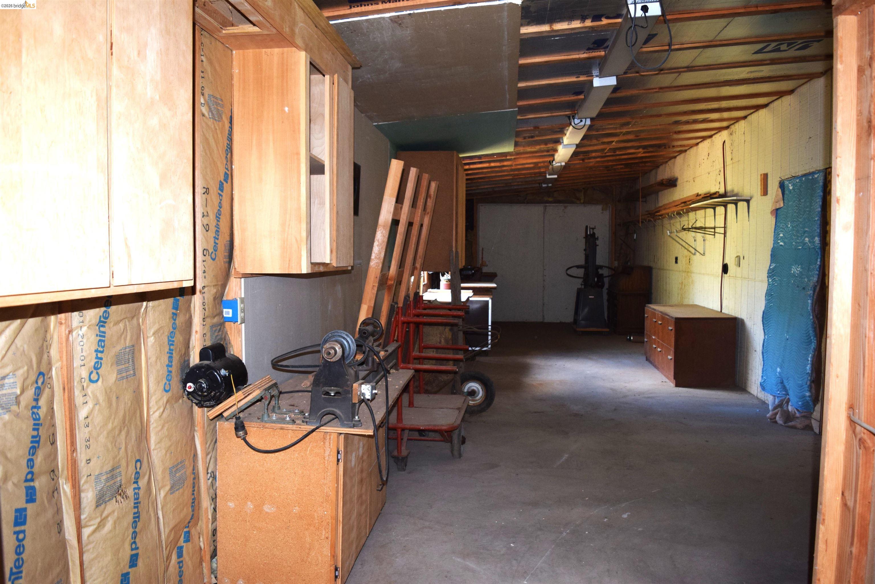 913 Quill Road Copperopolis, CA 95228 - Photo 24 of 55 a view of a room with gym equipment