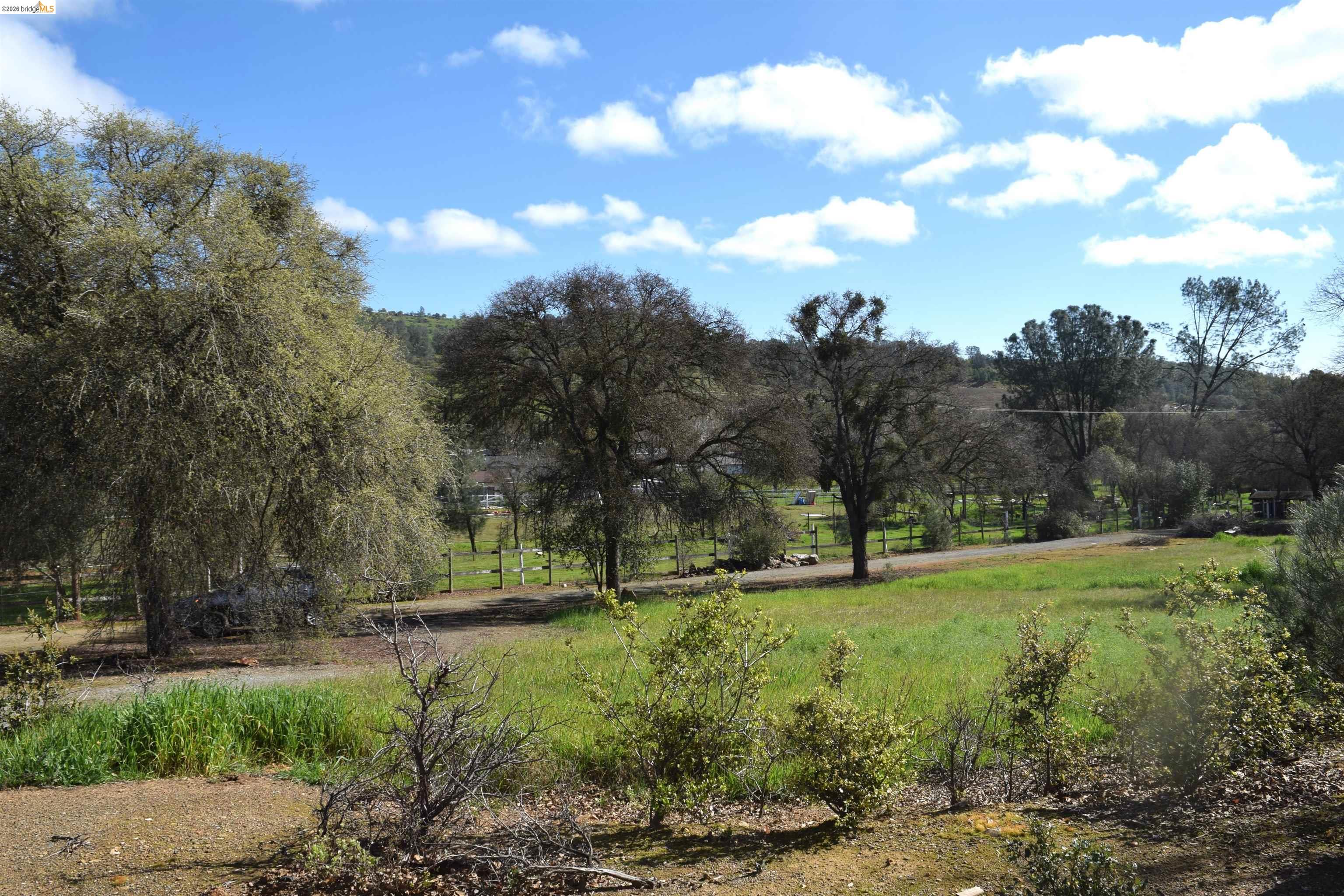 913 Quill Road Copperopolis, CA 95228 - Photo 39 of 55 a view of outdoor space with green field and trees