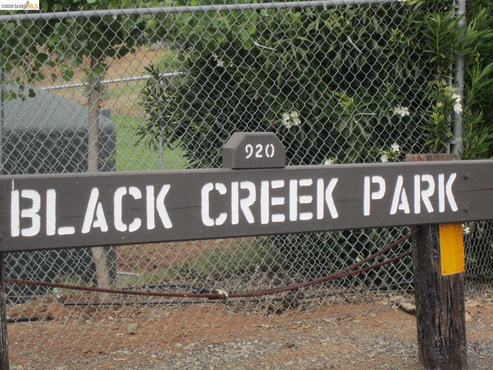913 Quill Road Copperopolis, CA 95228 - Photo 47 of 55 a street sign that is on a pole