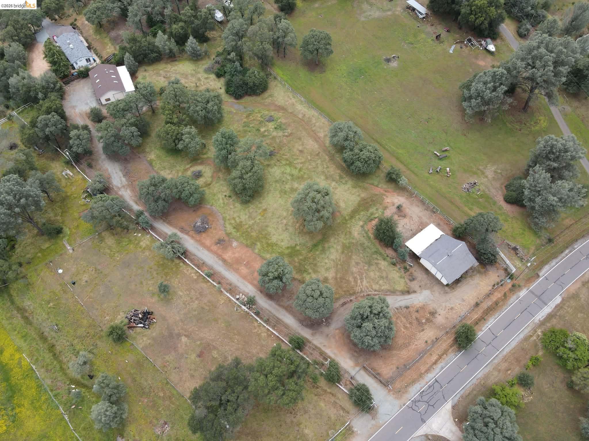 913 Quill Road Copperopolis, CA 95228 - Photo 51 of 55 an aerial view of a house with a yard